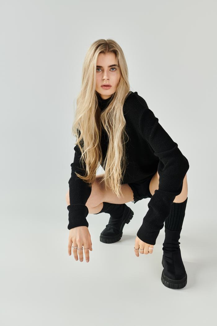 Blonde model in a chic studio portrait