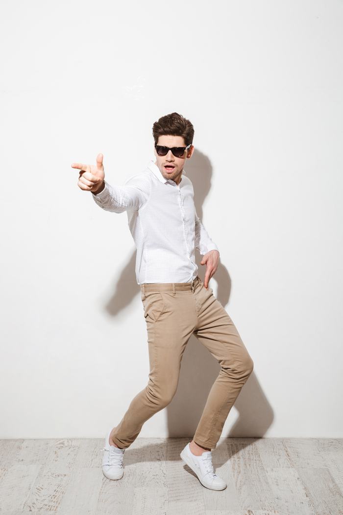 Full-length commercial shot of a stylish male model