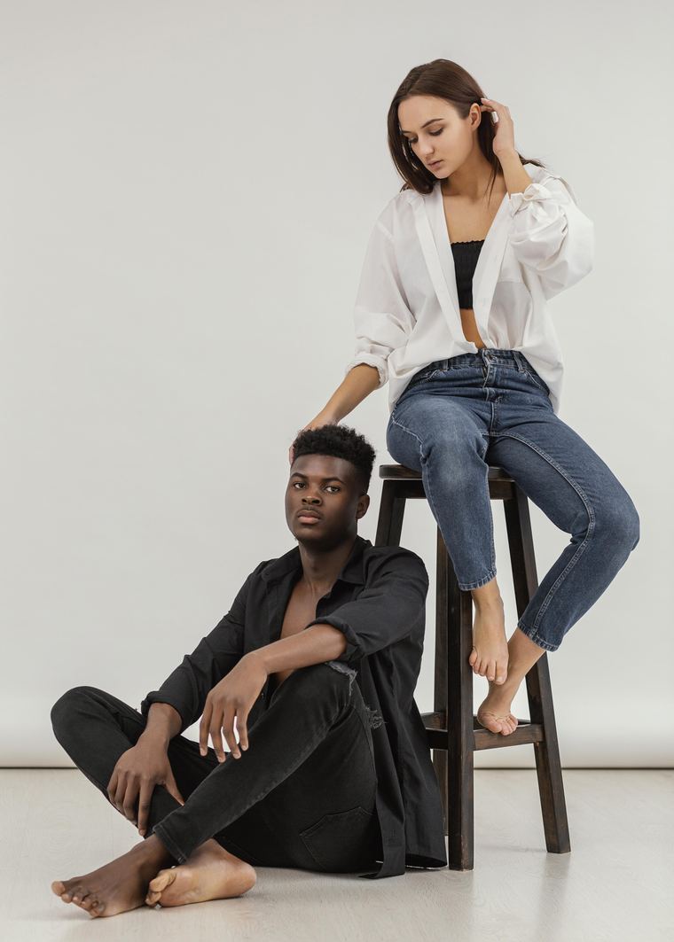 Two MAPS Studio models in a full-length studio portfolio session